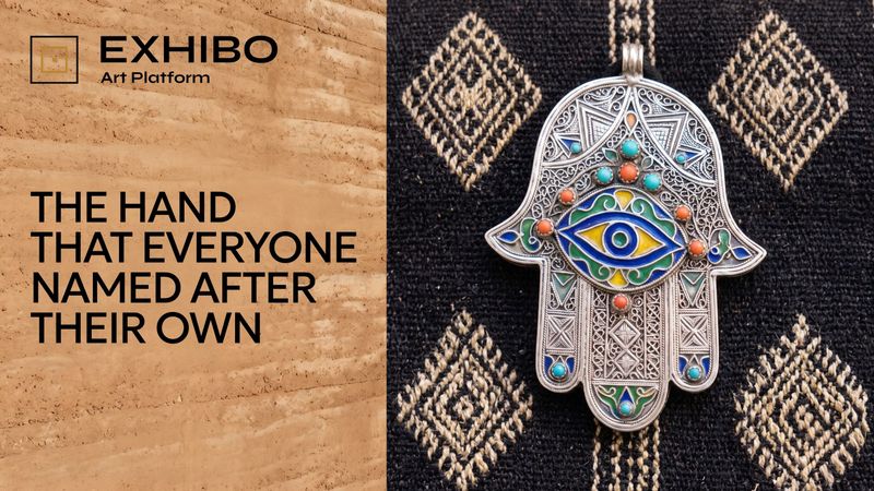 A geometric khamsa — an open five-fingered hand with an eye at its centre — in the Kabyle silver style of North Africa.