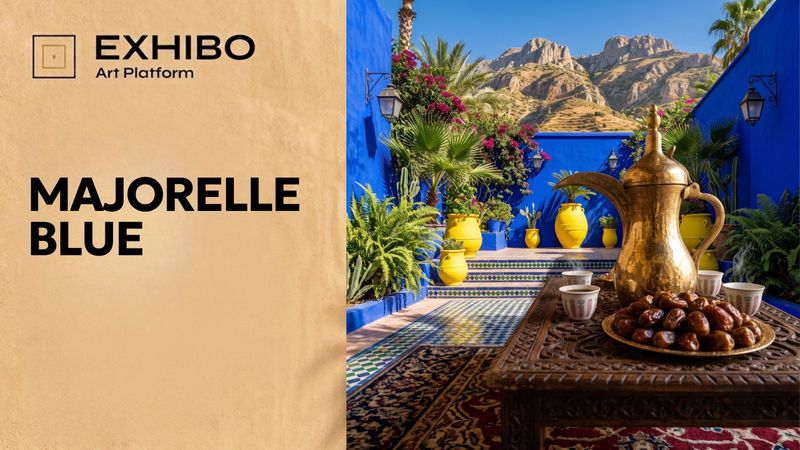 The cobalt-blue studio wall of the Jardin Majorelle in Marrakech, set against green foliage and terracotta pots in bright sun.
