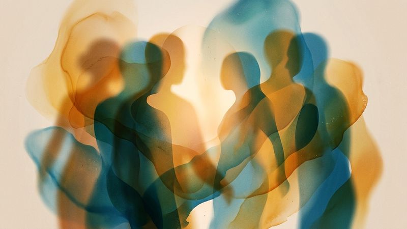 Abstract composition suggesting blurred figures and warm light, evoking intimacy and movement